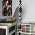 Handmade macrame crystal hanging ornament with natural gemstone and woven cord for decor. - Lava Tipsy Braided Bracelet