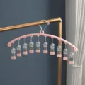 Stainless steel curved sock drying rack with multiple clips, windproof pink laundry hanger for underwear. - Horizontal Non-Slip Strong Clip / Sakura Pink