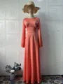 Elegant solid color long-sleeve maxi dress for women, featuring waist-cinching design and slim fit. - Coral