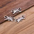 DIY alloy jewelry accessory bow charm connector for bracelet necklace making close-up view - Bow Connector (22I3-2) / 8x15mm / Antique Silver