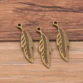 Antique bronze leaf metal pendant charm DIY jewelry accessory detail view close up display - Antique Bronze