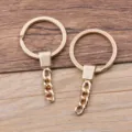 Golden metallic key ring detail shot with short chain, perfect for DIY jewelry crafting. - Approx 6.8g / KC Gold