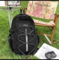 Black outdoor backpack with bungee cord design, lightweight travel daypack for hiking and camping. - L / Black