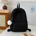 Zaino casual monocolore per ragazze, grande e leggero zainetto scolastico per viaggi. - Con Ciondolo / Taglia L / Nero
