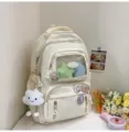 Süßer Schulrucksack mit transparenter Fronttasche, niedlicher Alltagsrucksack für Kinder. - Rucksack / Mit Abzeichen und Anhänger / Weiß