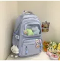 Niedlicher pastelllila Schülerrucksack mit transparenter Fronttasche, süßer Schulranzen - Rucksack / Mit Abzeichen und Anhänger / Blau