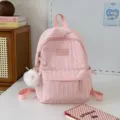 Zaino scolastico rosa plissettato per ragazze, zainetto da viaggio casual leggero. - Con Ciondolo / Taglia S / Rosa