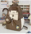 Niedlicher braun-weißer Studenten-Rucksack mit kleiner Münzbörse und klarem Plüschstern. - Rucksack Mit Anhänger / Braun