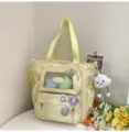 Süßer gelber Canvas-Itabag Rucksack mit transparentem Fach für schicke Schultage. - Studientasche / Mit Abzeichen und Anhänger / Gelb