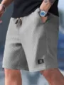 Herren Sommer Freizeit Waffelstrick Shorts mit Kordelzug und Taschen in Grau bequem fit. - Grau