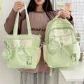 Niedliches hellgrünes Schüler Rucksack und Shopper Set mit kleinen Taschen und Sichtfenster. - 2-Teiliges Set Mit Anhänger / Grün