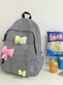 Schwarz-weißer Karorucksack mit süßen Schleifen für Schüler, leichter Freizeit-Tagesrucksack - L / Schwarz