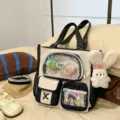 Süße farbblockierte Segeltuchtasche mit Sichtfenster, mehreren Fächern und Plüsch-Anhänger. - Tragetasche (Mit Anhänger Und Zwei Lollis) / Schwarz