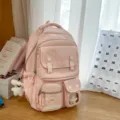 Rosa süßer Schulrucksack mit mehreren Fächern und Taschen für den täglichen Gebrauch. - Mit Anhänger / Rosa