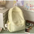 Japanischer süßer gelber Schulrucksack mit niedlicher Schleifenstickerei und leichtem Design. - Gelb Groß Mit Anhänger