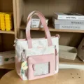 Rosa-weisse Segeltuchtasche mit Sichtfenster und Sternenmuster fuer dentaeglichen Gebrauch. - Rosa Tragetasche Mit Mondanhänger