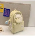 Süßer pastellgelber College Schulrucksack mit passender Minigeldbörse und Plüschtier für den Alltag - Mit Anhänger / L / Gelb