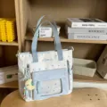 Blaue Sternen-Canvas-Itatasche, multifunktionale Schultasche mit transparenter Fronttasche. - Blaue Tragetasche Mit Mondanhänger