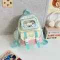 Süßer Pastell-Canvas-Schulrucksack mit klarem Ita-Fenster und Bären-Design für Kinder. - Grün Klein (Mit Abzeichen und Anhänger)