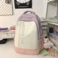 Süßer pastellfarbener Color-Block-Minirucksack, vielseitige Schultasche für Damen und Alltag. - Groß Lila mit Anhänger