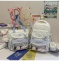 Japanischer Sweet-Ita-Rucksack und Tragetasche mit Sichtfenster und Plüschtier. - Rucksack und Tragetasche Set mit Hase und 4 Hunden / Blau