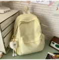 Japanischer süßer Rucksack in Bonbonfarbe mit Schleife für Schüler, leichter Freizeittagesrucksack. - Gelb Klein Mit Anhänger