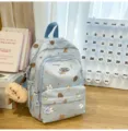 Süßer blauer Mini-Rucksack für Mädchen, lässige Sommer-Cartoon-Schultasche mit Anhänger. - Mit Anhänger / S / Blau