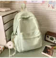 Hellgrüner japanischer Schulrucksack mit süßer Schleifenstickerei und flauschigem Plüsch-Anhänger. - Grün Klein Mit Anhänger