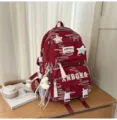 Stilvoller gesteppter Rucksack im koreanischen Stil mit großer Kapazität und niedlichen Anhängern. - Rot klein + 2 Schmetterlingssterne + Mondanhänger
