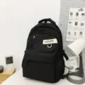 Sac à dos de campus noir classique avec grande capacité, tissu résistant et patch. - Noir (Sans Pendentif)