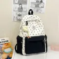 Süßer Rucksack mit Sternenmuster lässige schwarz-weiße Schultasche für Mädchen - Charm-Anhänger / Schwarz