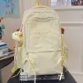 Lässiger hellgelber Freizeitrucksack, eleganter Schulranzen mit praktischen Taschen. - Gelb Mit Anhänger