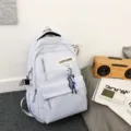 Sac à dos décontracté de grande capacité bleu clair pour étudiants, style collège chic. - Bleu avec Pendentif
