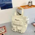 Freizeittasche aus Segeltuch mit vielen Taschen niedliche Schultasche fuer Damen - Shoulder Bag with Charm / Weiß