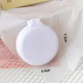Tragbare klappbare Haarbürste mit Spiegel rund weiß kompakte Make-up Kamm für Reise - Weiß