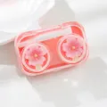 Roze kersenbloesem contactlenzen etui, draagbare dubbele transparante lenzenverzorgingsdoos. - Brillendozen in de vorm van een kersenbloesem-ijslolly