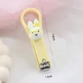 Niedlicher Cartoon Kaninchen Klapp-Nagelknipser tragbar, gelbe Farbe, kompakte 7,8cm Grösse. - Gelber Hase mit Brille