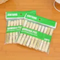 Natural bamboo clothespins in 20pc packs with green packaging header for home and daily use. - 20 Pcs / 6cm