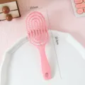 Rosa gebogene Haarbürste, hohle Massagebürste für tägliches Styling und Haarpflege. Länge 23,5cm. - Rosa Haarkamm