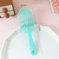 Mint green hollow hairbrush curved vent massage comb for daily hair care and styling 23.5cm - Minimalist Style / Green Hair Comb