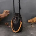 Vintage genuine leather bucket bag for women drawstring crossbody shoulder bag with wooden beads. - Black