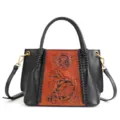 Handgefertigte Echtleder-Handtasche mit Blumenmuster und schwarzen geflochtenen Seiten. - Schwarz