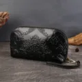 Black embossed genuine leather phone wallet, retro floral clutch bag with wrist strap. - Black