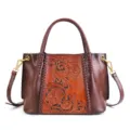 Vintage genuine leather tote bag with carved floral pattern, distressed finish, and braided design. - Coffee