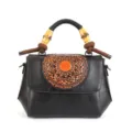 Vintage leather handbag with mandala embossed flap and bamboo handle for women stylish daily use. - Black
