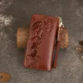 Genuine leather embossed long wallet for women with wrist strap and zip-around closure. - Brown
