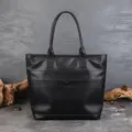 Classic black leather tote bag for women, large capacity shoulder bag for daily commute. - Black