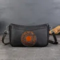 Vintage black cowhide leather shoulder bag with embossed mandala floral design, casual chic underarm bag. - Black