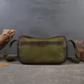 Vintage green leather shoulder bag, handmade vegetable tanned pillow bag for women. - Green
