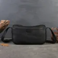 Black genuine leather underarm bag, retro solid color pillow shoulder bag for women. - Black
